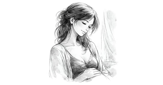 Portrait d’une femme enceinte d’environ 30 ans, apaisée et rassurée, illustrant l’usage d’un vibromasseur pendant la grossesse en toute sécurité.